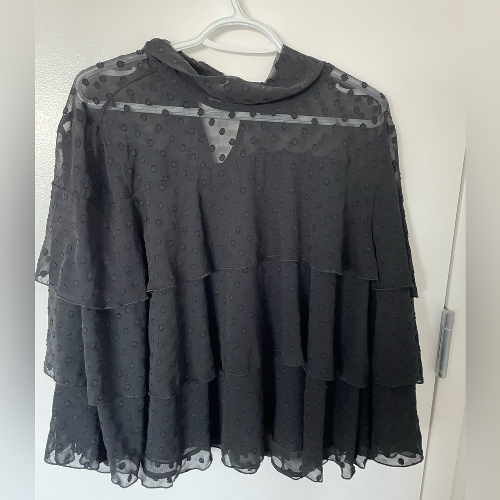 Sheer ruffled black top